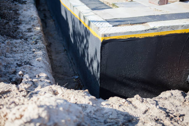 Professional Waterproofing technician working in Hamler, OH